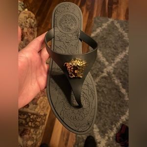 Black Versace sandals with gold emblem